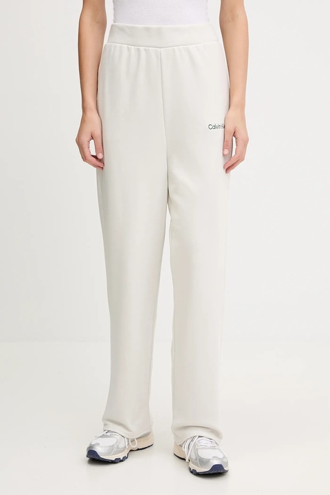 Calvin Klein Performance spodnie dresowe damskie kolor beżowy gładkie LVGWF5P627 - zdjęcie produktu nr 1