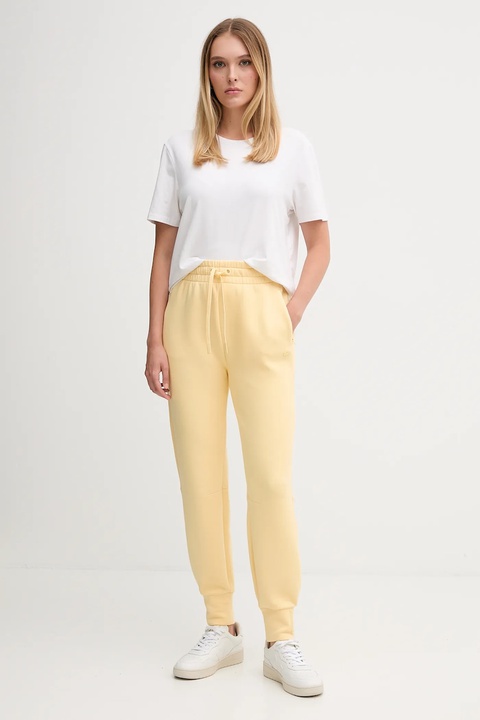 Lacoste spodnie dresowe kolor żółty gładkie XF0343 - zdjęcie produktu nr 2