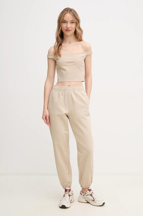 Calvin Klein Jeans spodnie dresowe damskie kolor beżowy gładkie LV047B235G - zdjęcie produktu nr 2