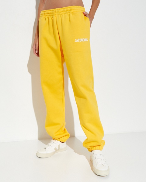 JACQUEMUS - Żółte spodnie dresowe z logo - zdjęcie produktu nr 1