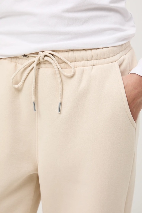 Medicine spodnie dresowe damskie kolor beżowy gładkie - zdjęcie produktu nr 1
