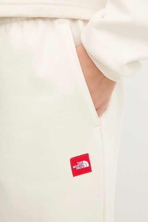 The North Face spodnie dresowe Redbox damskie kolor beżowy gładkie NF0A8EG2QLI1 - zdjęcie produktu nr 1